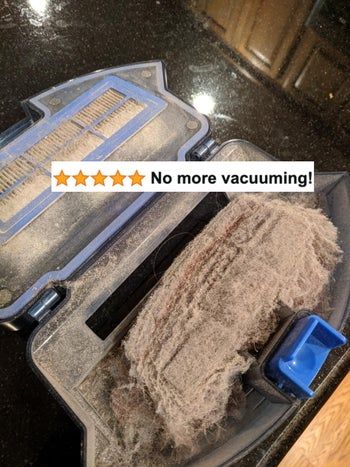 A five-star review is displayed above a dust-filled vacuum filter, with the text included.