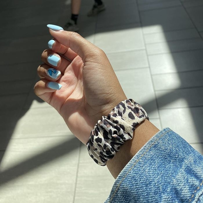 The same reviewer showing off the scrunchie band from a different angle