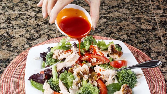 Ketchup dressing served in a teacup