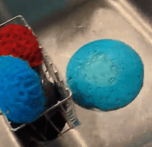 A gif of a reviewer using the disposer cleaner in their kitchen sink.