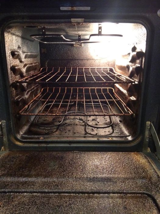 Before image showing a crusty oven with burnt remnants