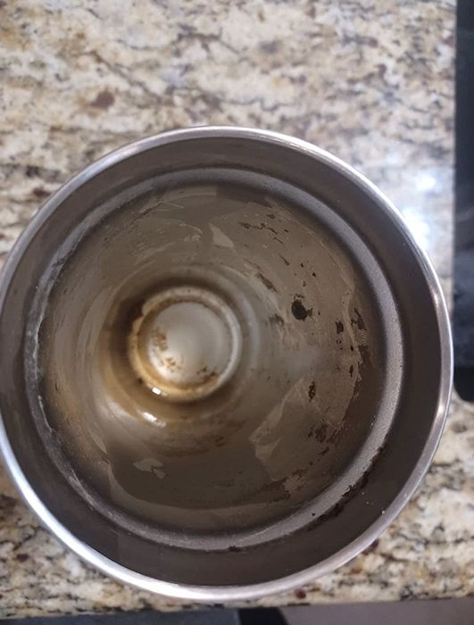 The inside of a grimy Yeti cup