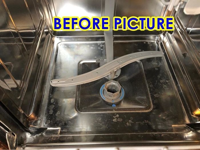 Before: a dishwasher with noticeable water spots around the base.