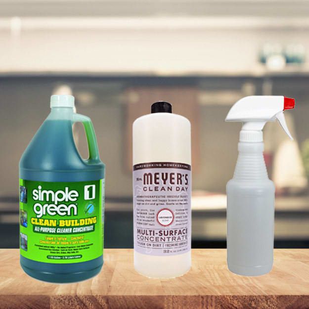 Containers of the two concentrates listed below placed next to a reusable spray bottle.