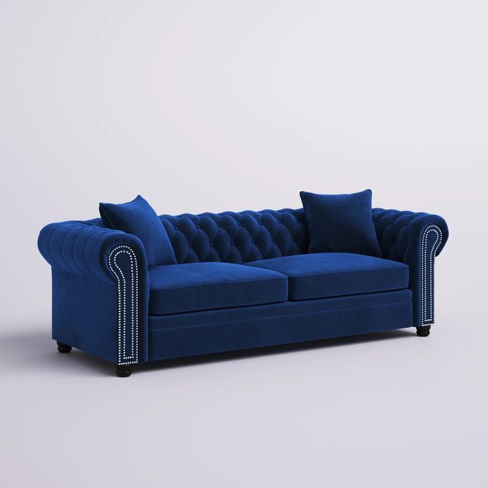 a navy blue upholstered piece