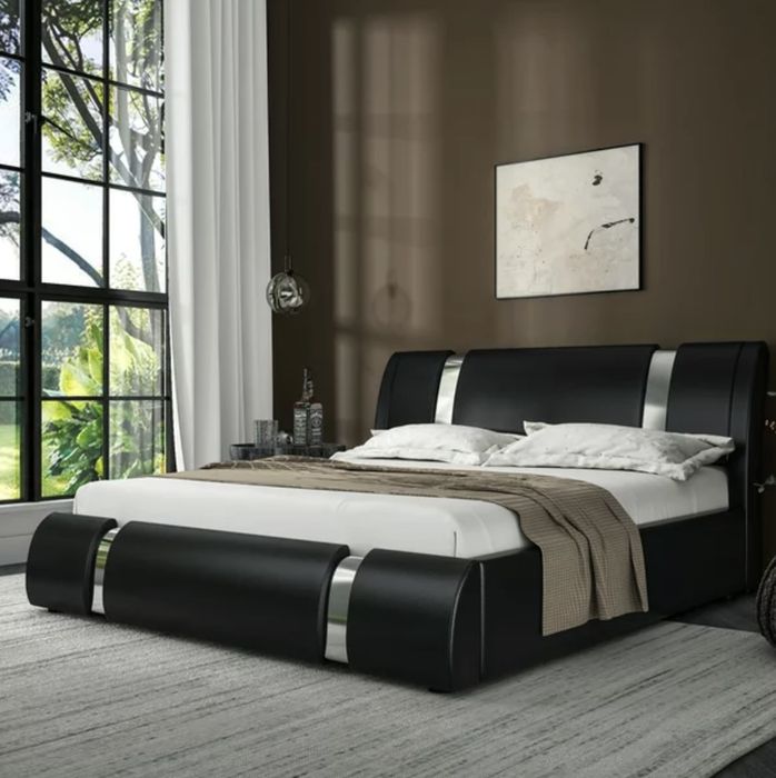 iron-framed black platform bed