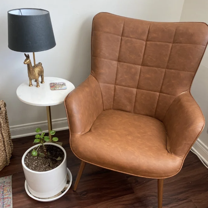 the brown faux leather chair