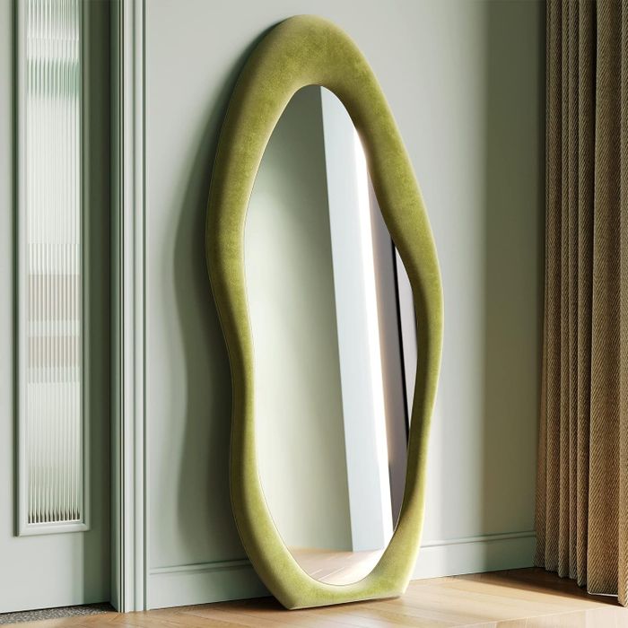Full-length mirror with a distinctive wavy frame, perfect for home decor