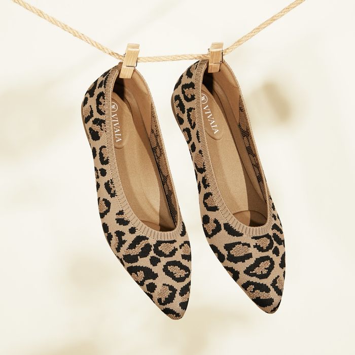 a pair of knot pointed ballet flats in leopard print