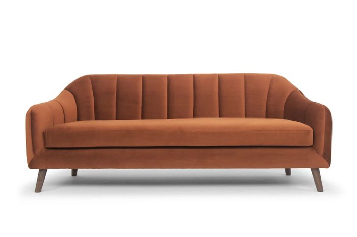 a stax rust-colored upholstered sofa