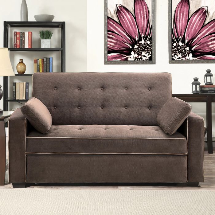 a java-colored sleeper sofa in a cozy living room