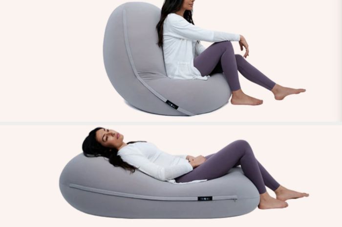 Model sitting upright and laying flat in the product, both against a cream backdrop