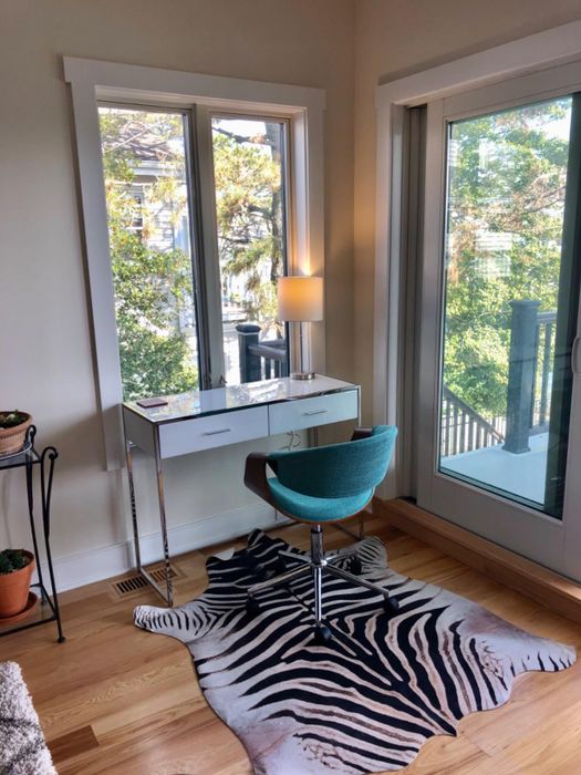 Another reviewer has the zebra rug beneath their desk chair, adding some flair to their workspace.