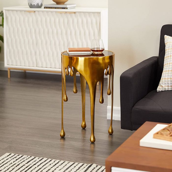 The gold end table