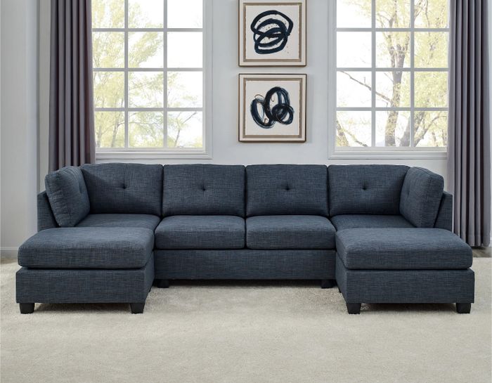a blue polyester sectional with two ottomans for extra comfort