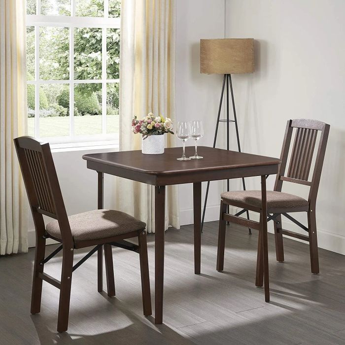 a dark wooden square dining table accompanied by two chairs