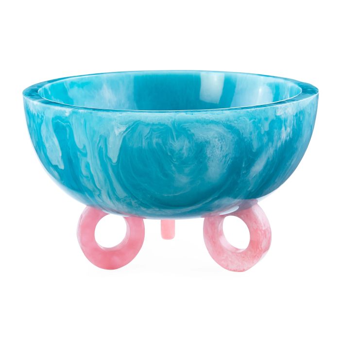 A chic acrylic bowl with a marbled blue design and pink circular legs, perfect as a decorative piece or as a distinctive serving dish.