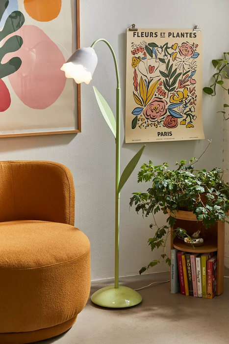 The elegant white tulip lamp with a leafy stem design.