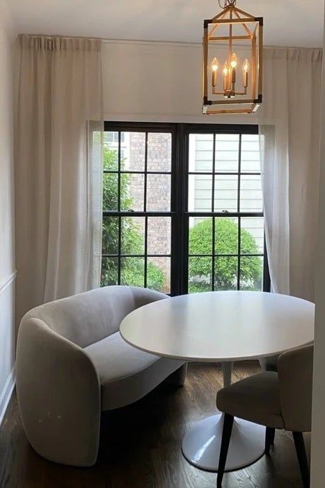 a stax rosa loveseat placed near a breakfast nook