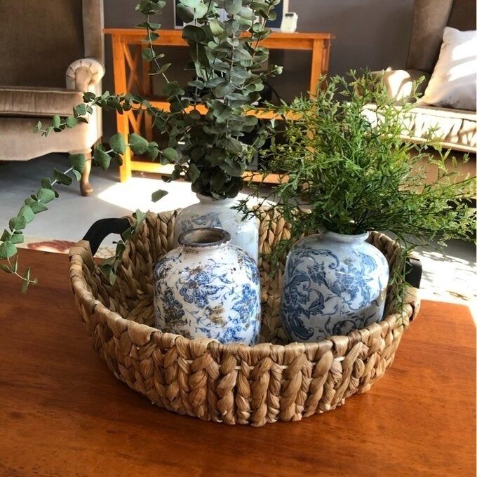 A reviewer's photo showcasing the three vases displayed on a table.
