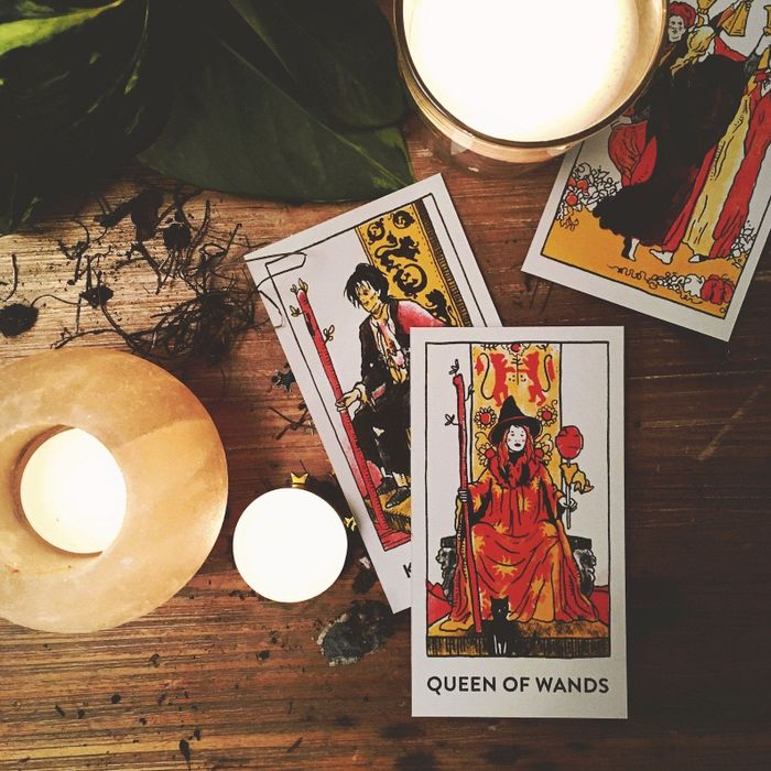 a trio of illustrated tarot cards featuring beloved characters from the film
