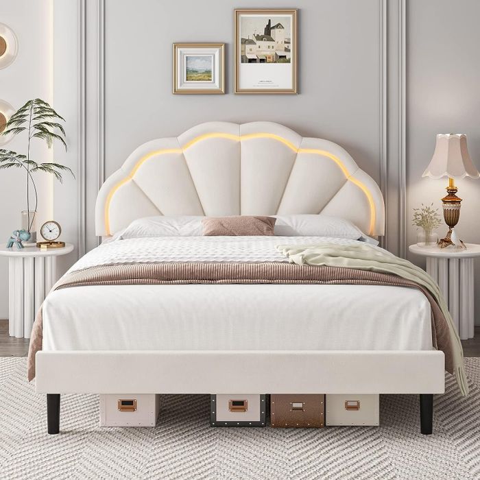 The bed illuminated with a warm yellow light.