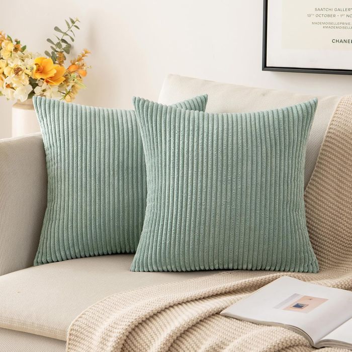 Two blush gray corduroy covers on throw pillows