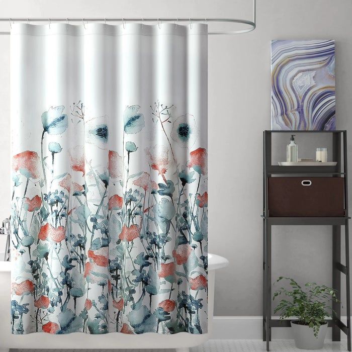 The floral-patterned curtain draped in the shower
