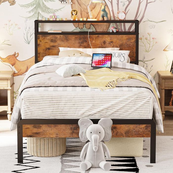 Industrial-style brown twin bed frame paired with striped gray bedding.
