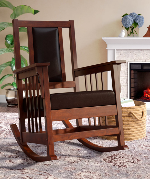 A rich dark brown wooden rocking chair with slatted sides, and a padded seat and backrest in brown for maximum comfort