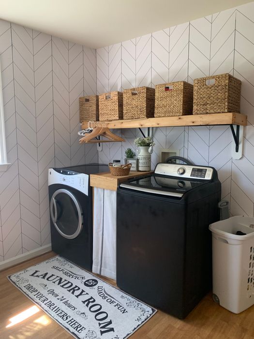 The same storage baskets in a reviewer's laundry room, showing their versatility.