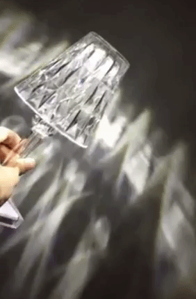 A gif from the seller showcasing how this lamp sparkles as light reflects off its surface.