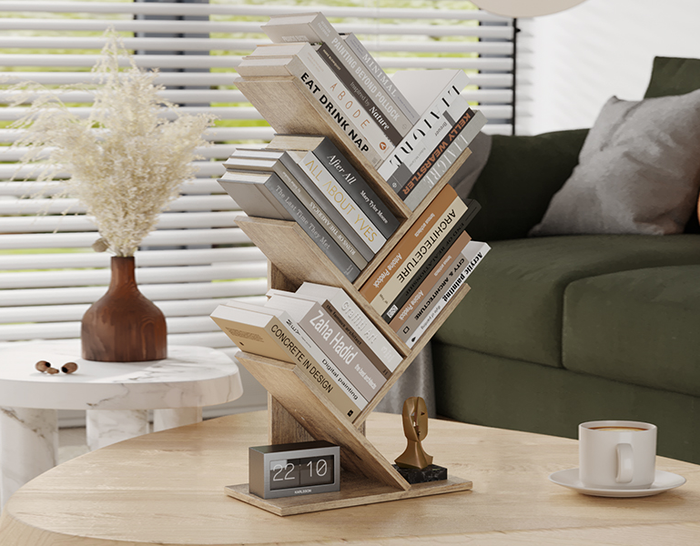 The wood tree bookshelf displaying a variety of books