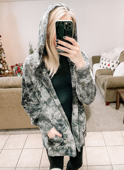 Reviewer styling the tie-dye cardigan.