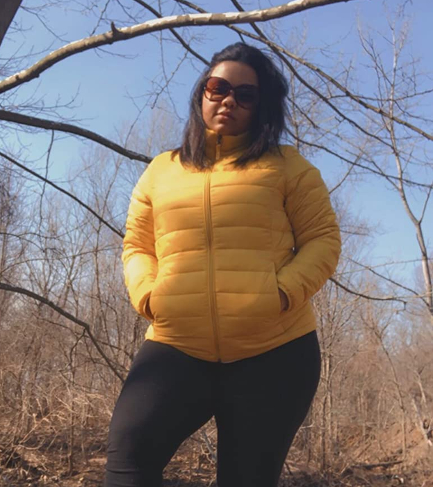 Another reviewer showcasing the yellow puffer jacket.