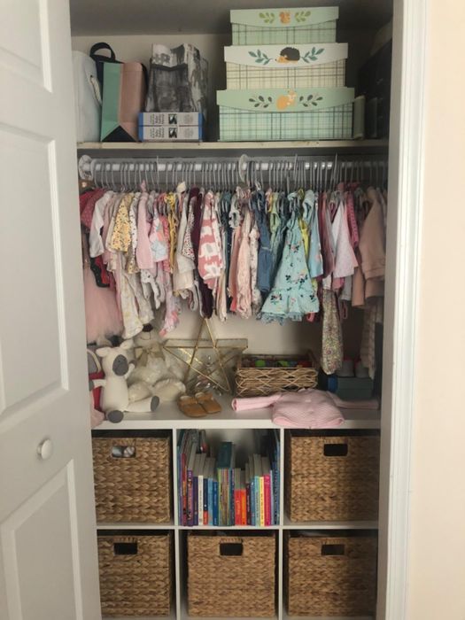 The wicker baskets neatly arranged in a reviewer's closet.