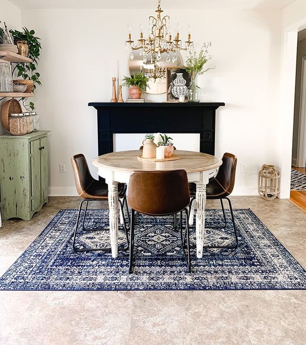 The blue and white rug with a brushed pattern.