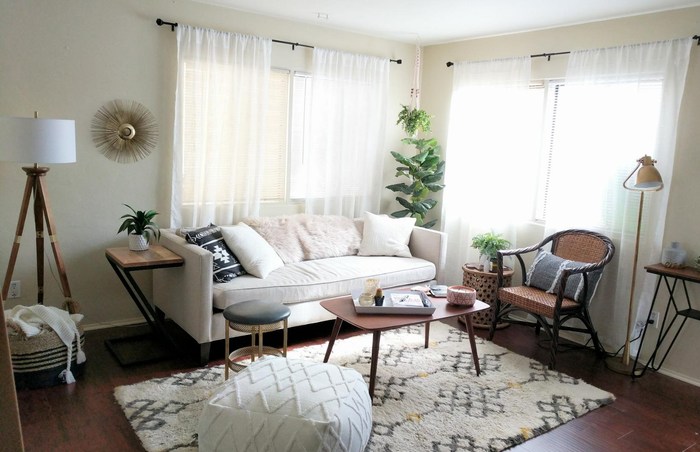 The curtains in a reviewer's cozy living room, letting light flood in while maintaining privacy.