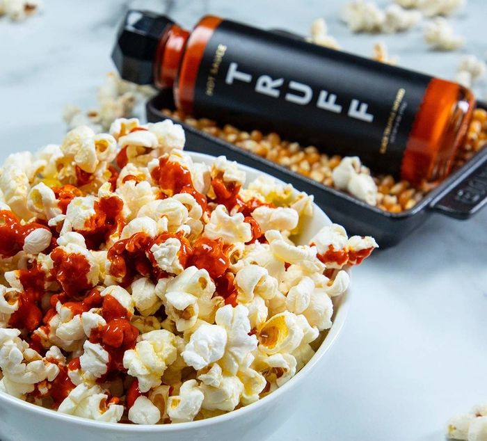 The sauce drizzled over a serving of popcorn