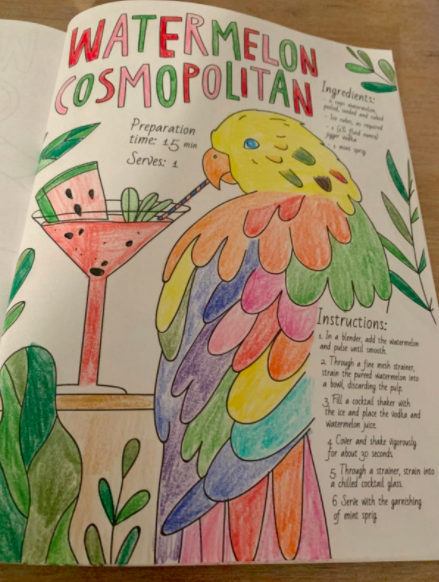 Reviewer displays a page they colored in that features a