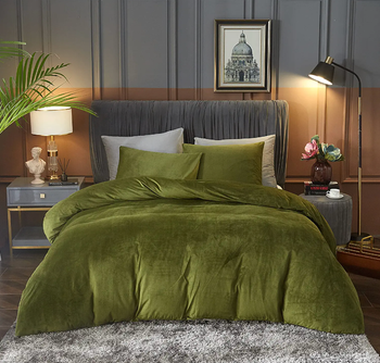 A rich green duvet and matching shams, ready to add warmth to your fall bedding.