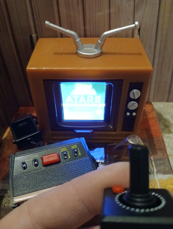 A miniature vintage TV with 