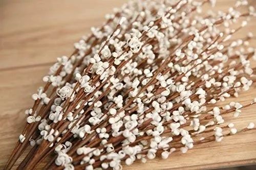 A bundle of white faux jasmine flowers