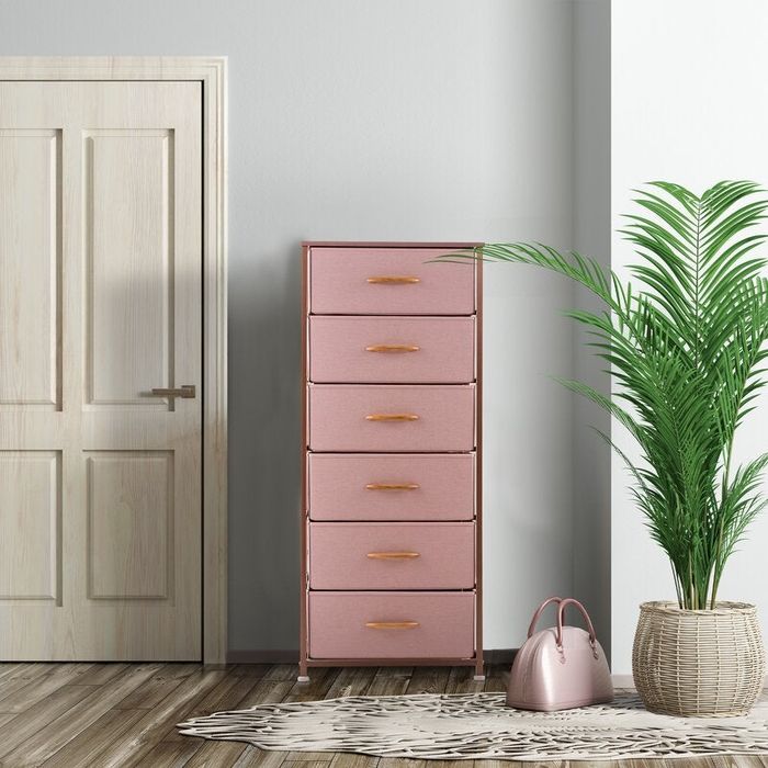 Lifestyle photo of a pink fabric dresser