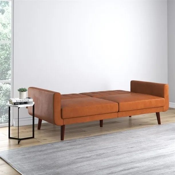 The futon converted into a comfortable bed.