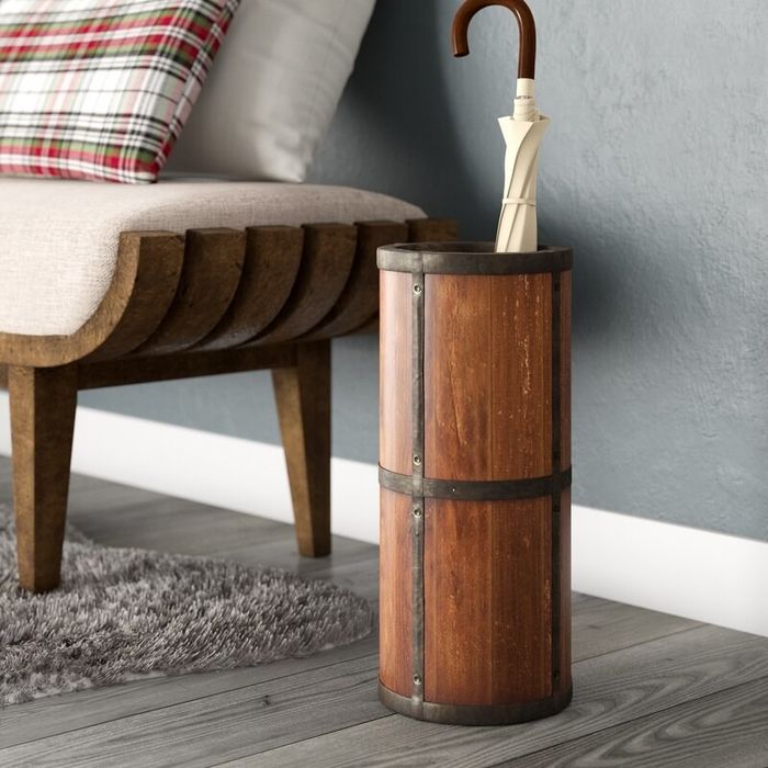 the wooden umbrella stand