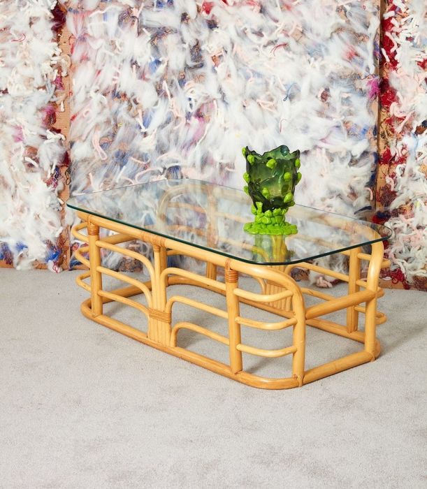 The rattan and glass coffee table