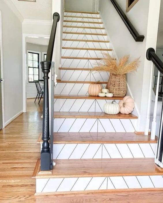 The white and black chevron-patterned stair riser