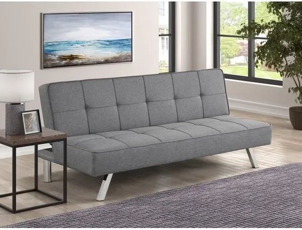 A gray futon in the living room