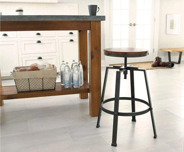 The stool placed next to a kitchen island